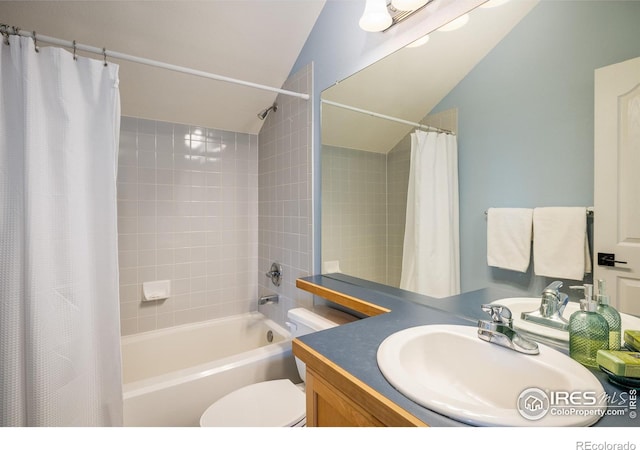 301 Indian Peaks Trl W, Lafayette, CO 80026 - bathroom featuring vanity, lofted ceiling, shower / bath combination with curtain, and toilet