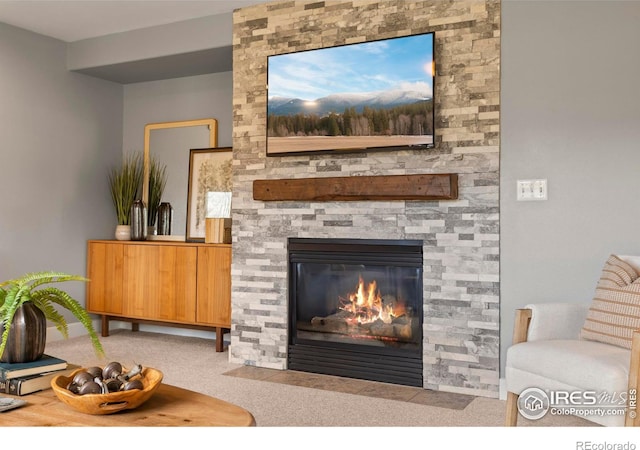 interior space featuring a stone fireplace