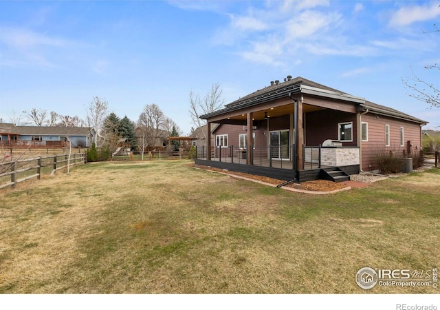 view of yard featuring a fenced backyard