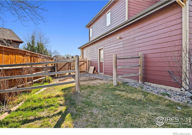 view of yard featuring a fenced backyard