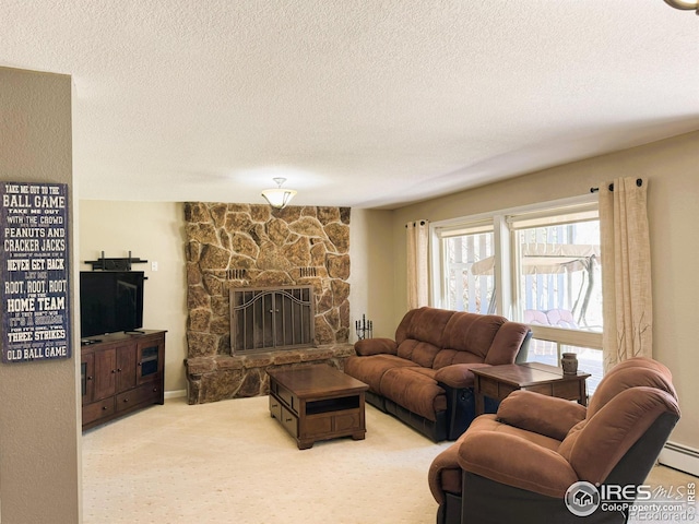 living area with a textured ceiling, a fireplace, and light carpet