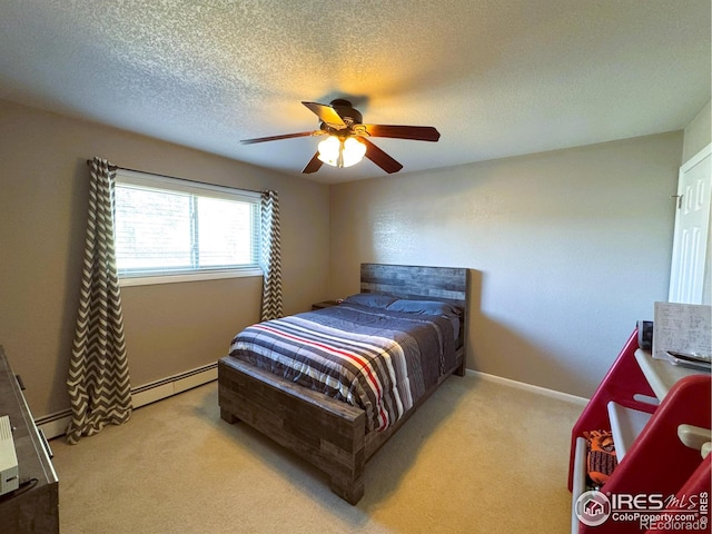 bedroom featuring carpet flooring, baseboards, a textured ceiling, ceiling fan, and a baseboard radiator