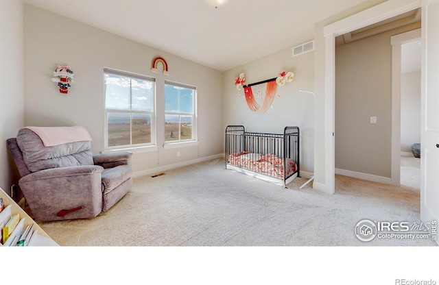 1563 Stoneseed St, Berthoud, CO 80513 - bedroom with baseboards, visible vents, carpet flooring, and a nursery area