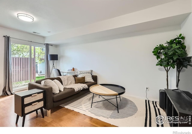 3790 Iris Ave Unit B, Boulder, CO 80301 - living area featuring light wood-style floors, baseboards, and visible vents