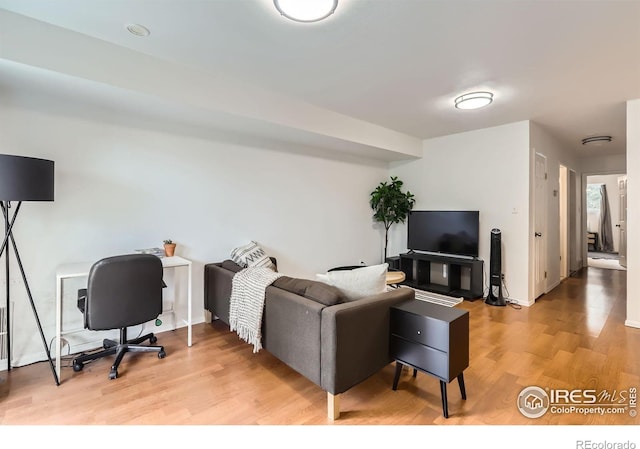 3790 Iris Ave Unit B, Boulder, CO 80301 - living area featuring light wood-style floors and baseboards