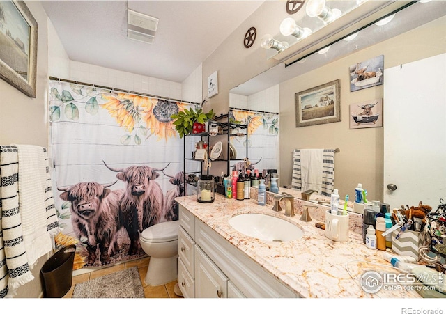 full bath with visible vents, toilet, vanity, a shower with curtain, and tile patterned flooring