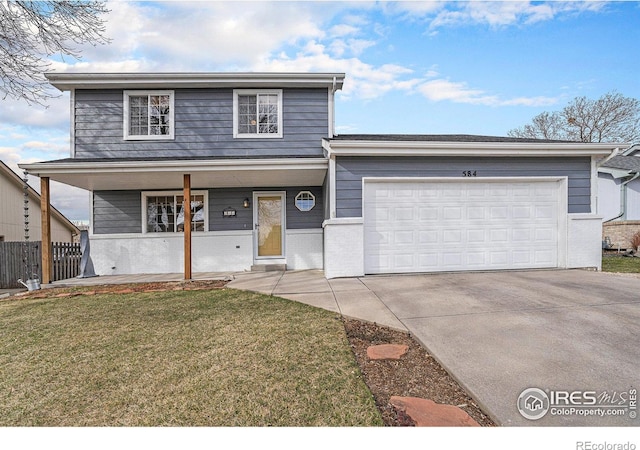 584 Sunwood Dr, Loveland, CO 80538 - view of front facade featuring concrete driveway, fence, a front lawn, a porch, and a garage