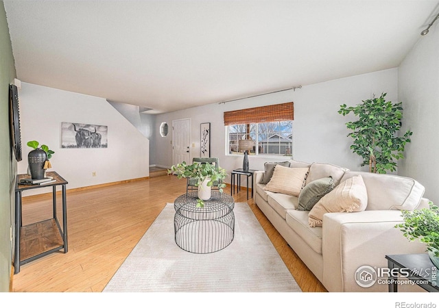 584 Sunwood Dr, Loveland, CO 80538 - living area featuring baseboards and light wood-style floors