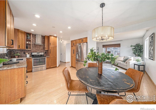 584 Sunwood Dr, Loveland, CO 80538 - dining space with light wood-style flooring, recessed lighting, and plenty of natural light