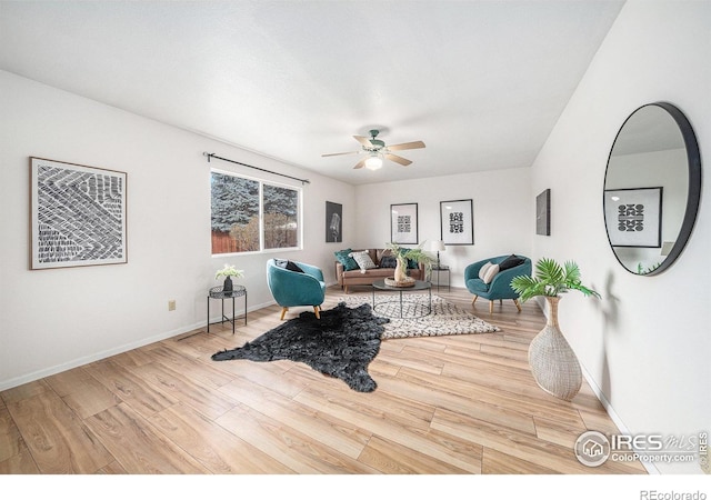 584 Sunwood Dr, Loveland, CO 80538 - living room with baseboards, wood finished floors, and a ceiling fan