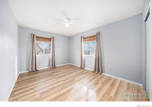 584 Sunwood Dr, Loveland, CO 80538 - empty room featuring a ceiling fan, baseboards, and wood finished floors