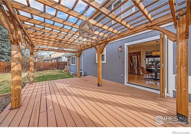 584 Sunwood Dr, Loveland, CO 80538 - wooden terrace featuring a lawn, fence, and a pergola