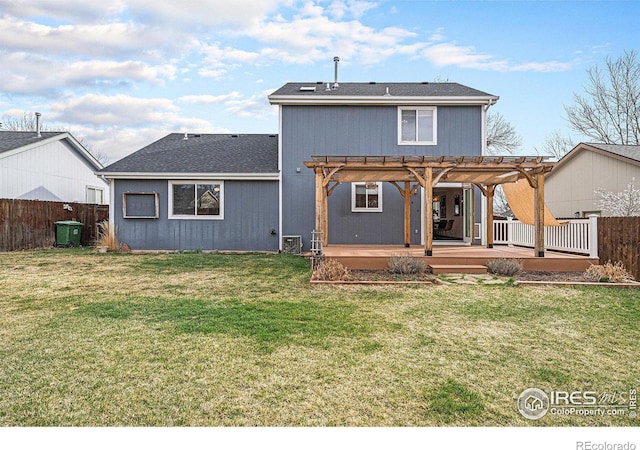 584 Sunwood Dr, Loveland, CO 80538 - back of property featuring a pergola, a wooden deck, fence, and a yard