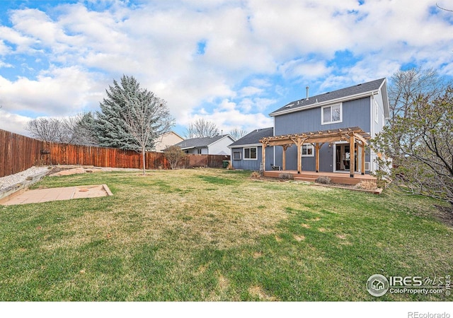 584 Sunwood Dr, Loveland, CO 80538 - back of house featuring a fenced backyard, a pergola, a patio area, and a lawn