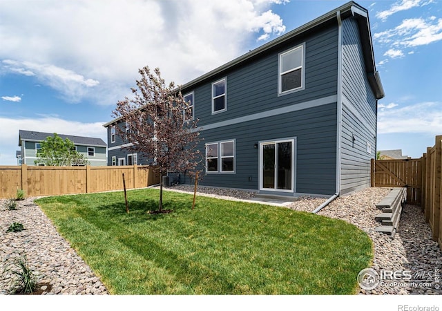 7153 Feather Reed Dr, Wellington, CO 80549 - back of house featuring a fenced backyard