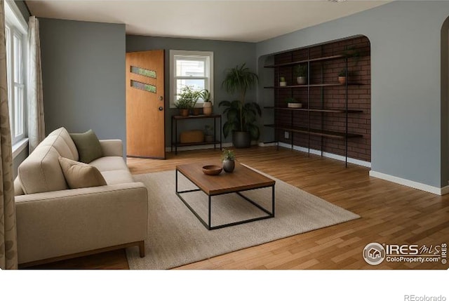 117 Welch Ave, Berthoud, CO 80513 - living room with wood finished floors and baseboards
