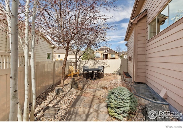 1827 Prairie Ridge Dr, Fort Collins, CO 80526 - view of yard with a fenced backyard and a patio area