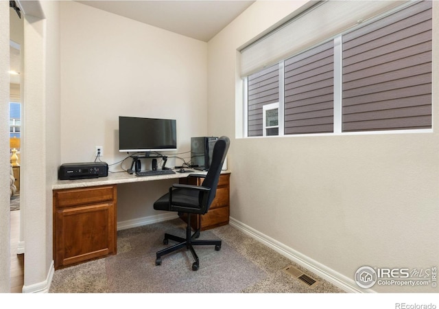 office with baseboards, carpet floors, and visible vents