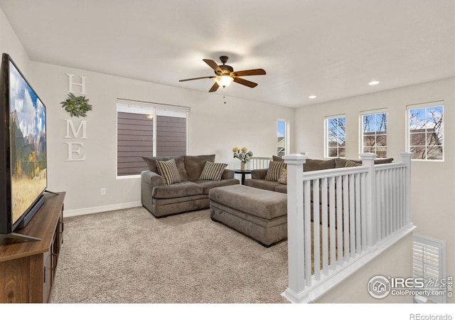carpeted living area featuring recessed lighting, baseboards, and ceiling fan