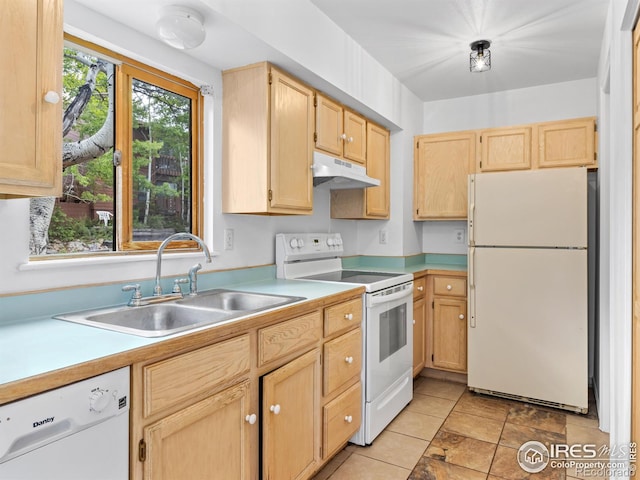 1010 S Saint Vrain Ave S, Estes Park, CO 80517 - kitchen featuring white appliances, under cabinet range hood, a sink, light brown cabinetry, and light countertops