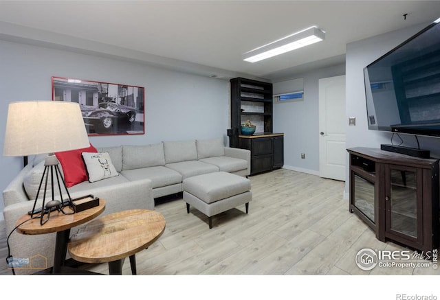 living room featuring light wood-type flooring