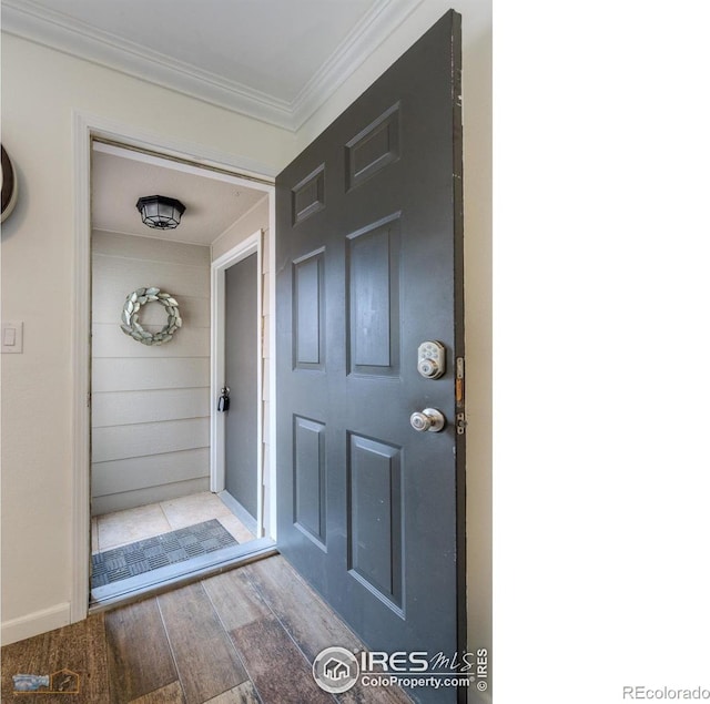 doorway to property featuring stucco siding