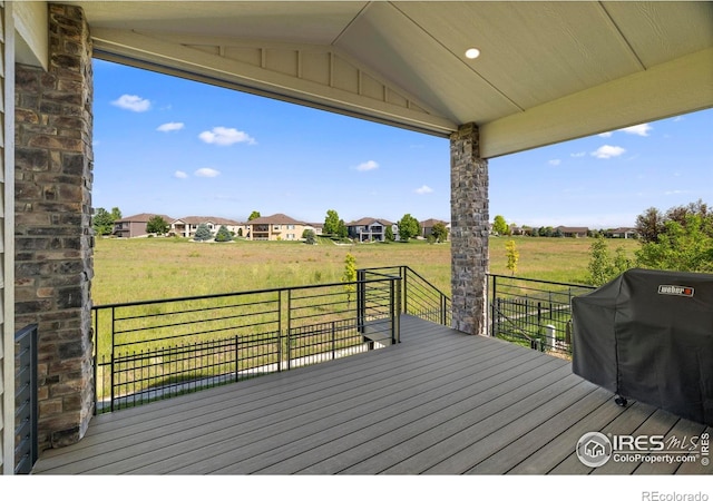 5977 Crooked Stick Dr, Windsor, CO 80550 - wooden deck featuring area for grilling and a lawn