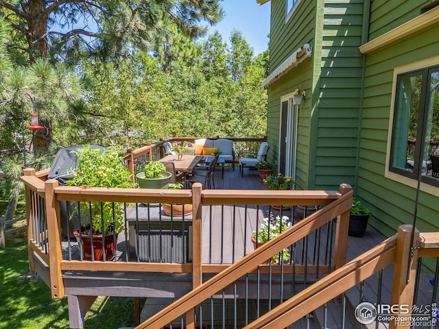 1117 Barberry Ct, Boulder, CO 80305 - wooden deck with an outdoor living space
