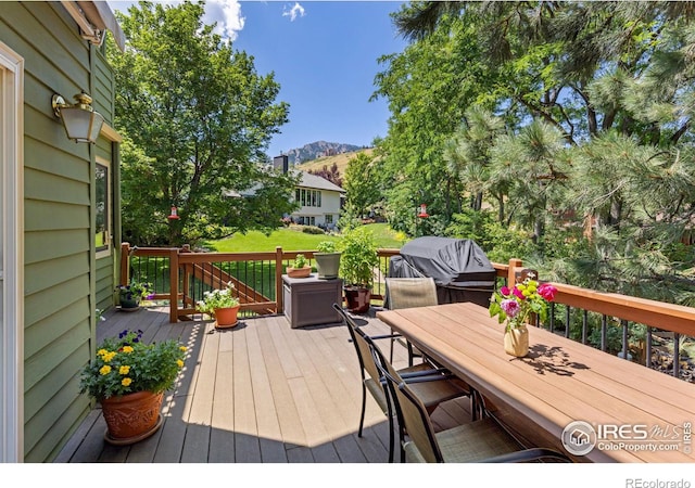 1117 Barberry Ct, Boulder, CO 80305 - deck featuring a mountain view, area for grilling, and outdoor dining area