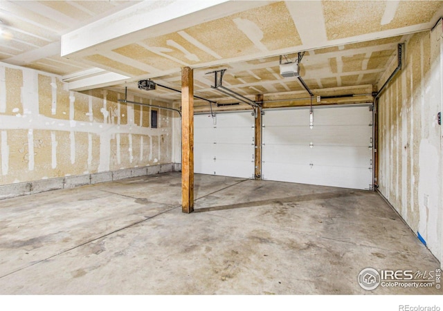 garage featuring a garage door opener