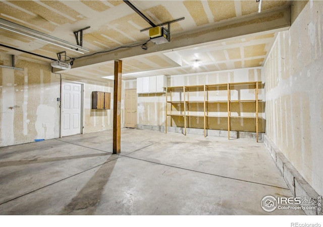 garage featuring a garage door opener