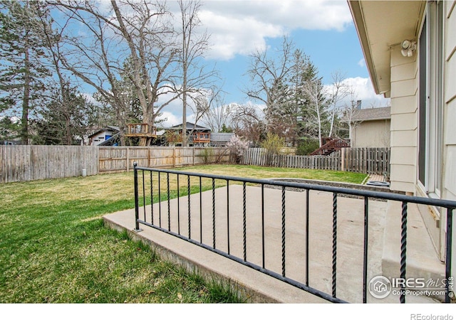 view of yard with a fenced backyard