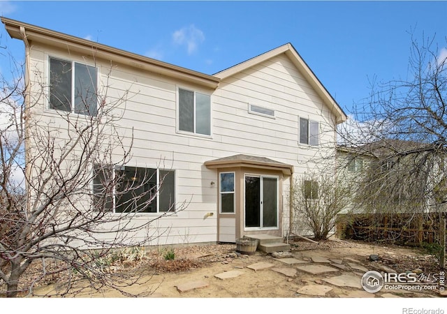view of front of home featuring fence and entry steps