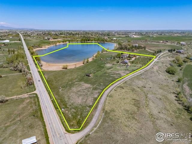 4514 Hoot Owl Dr, Berthoud, CO 80513 - aerial view of property and surrounding area featuring a nearby body of water and property parcel outlined