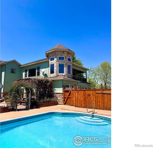 4514 Hoot Owl Dr, Berthoud, CO 80513 - view of swimming pool featuring fence