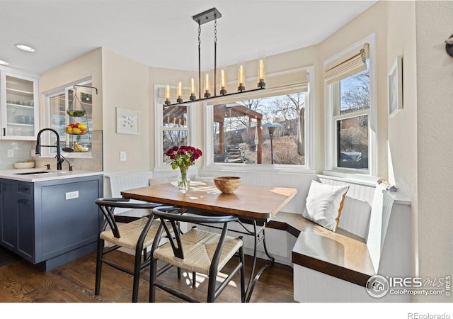 501 W Linden St, Louisville, CO 80027 - dining space featuring dark wood-style floors and wainscoting