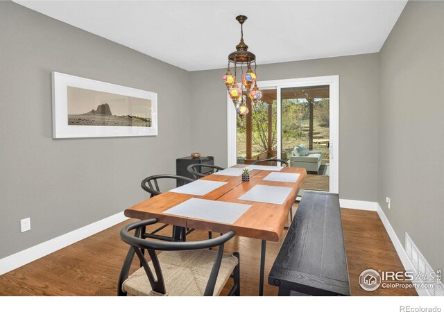 501 W Linden St, Louisville, CO 80027 - dining space with baseboards and wood finished floors