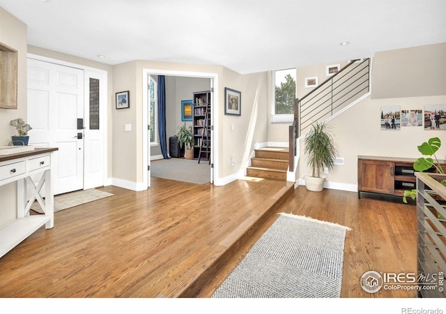 501 W Linden St, Louisville, CO 80027 - entryway with stairs, wood finished floors, and baseboards