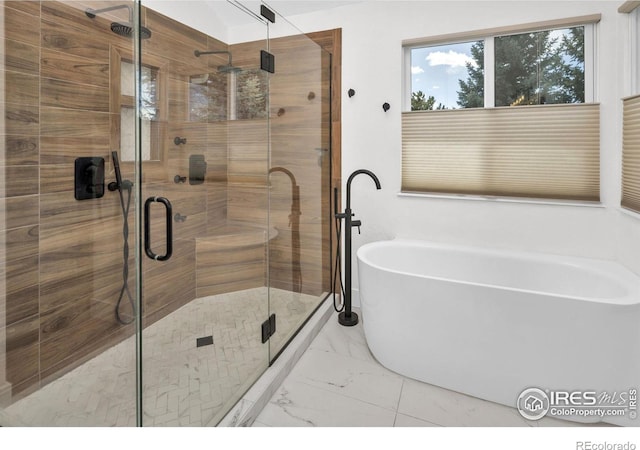 501 W Linden St, Louisville, CO 80027 - full bath featuring marble finish floor, a freestanding tub, and a shower stall