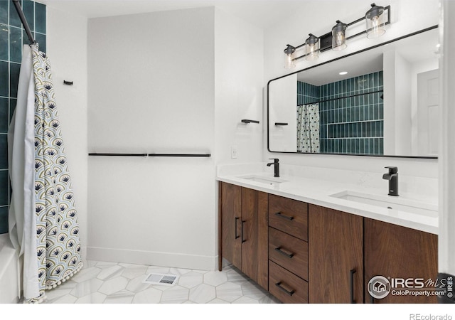 501 W Linden St, Louisville, CO 80027 - bathroom with double vanity, a sink, baseboards, and a shower with shower curtain