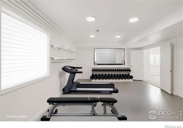 workout area with recessed lighting and baseboards