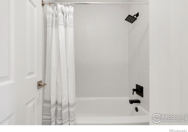 bathroom with shower / tub combo