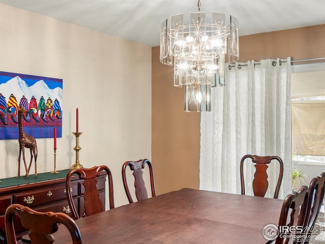 dining area with a chandelier