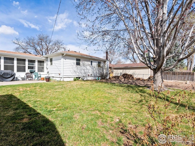 view of yard with fence and a patio area