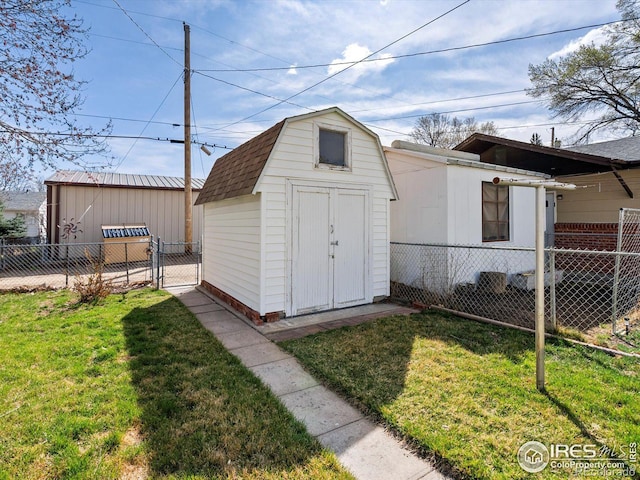 view of shed with fence
