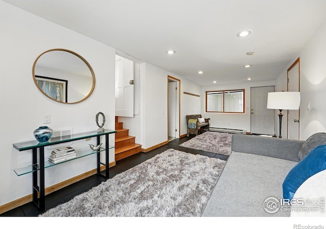 living area with recessed lighting, baseboards, stairway, and baseboard heating