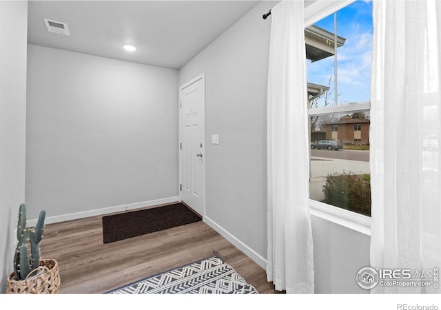 702 S Fulton Ave, Fort Lupton, CO 80621 - doorway with wood finished floors and baseboards