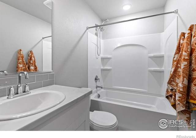 702 S Fulton Ave, Fort Lupton, CO 80621 - full bath featuring tub / shower combination, vanity, and backsplash