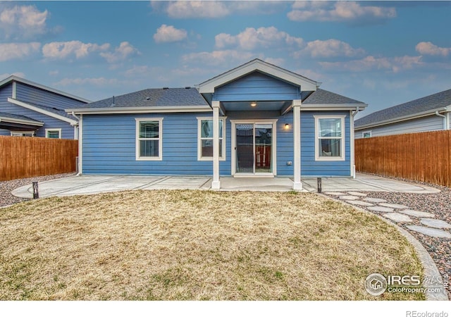 702 S Fulton Ave, Fort Lupton, CO 80621 - back of house featuring a patio and a fenced backyard