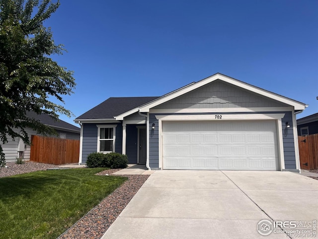 702 S Fulton Ave, Fort Lupton, CO 80621 - single story home featuring a garage and driveway
